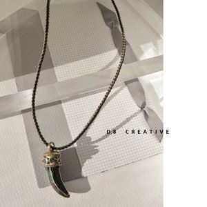 New black onyx gold tone inlaid horns pendant with hand braided chain necklace